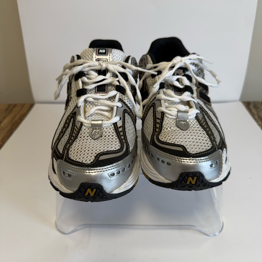 New Balance Silver and Black Sneakers